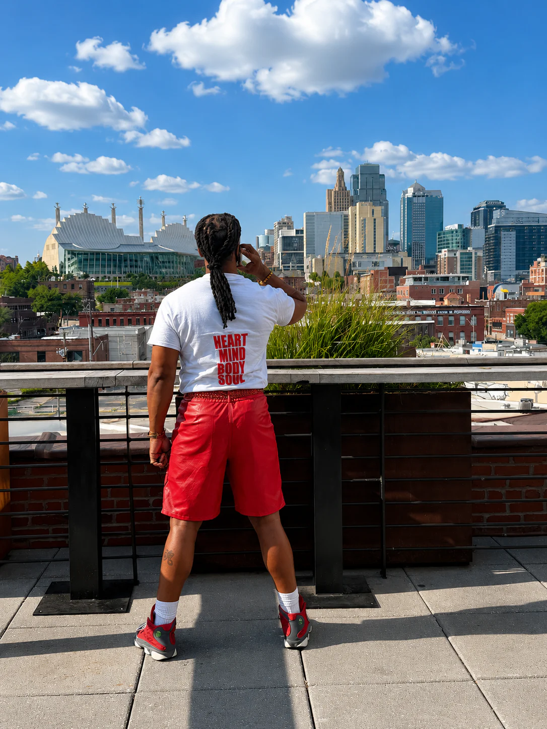 Trust It Shirt back worn on a rooftop